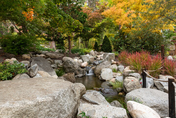 Autumn colors at Japanese Garden, Lithia Park, Ashland, Oregon, in 2023, including small waterfall in long exposure - 766636451