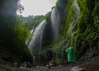 View of Madakaripura Waterfall in a green canyon located in East Java, Indonesia	