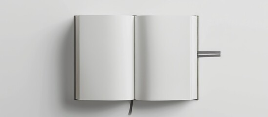 Design idea: Overhead perspective of a white notebook with an elastic band, showcasing open and...