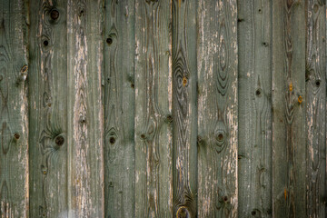 Wooden background from old boards with knots and nails