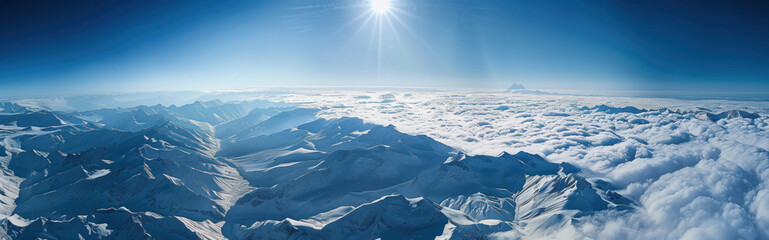 Panoramic view of snow capped mountains. Winter landscape with snow covered mountains panorama banner
 - Powered by Adobe