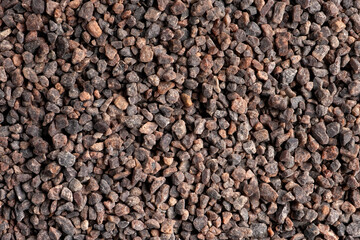 Black Himalayan salt (Namak shell salt) on a white background