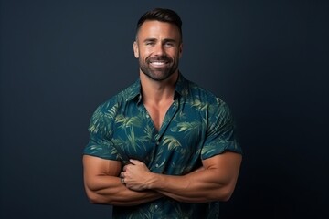 Portrait of a handsome man smiling with arms crossed over dark background - obrazy, fototapety, plakaty