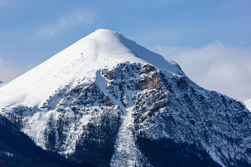 Closeup of snowcapped Fairview Mountain as viewed from Morant's Curve near Lake Louise in Banff National Park, Alberta, Canada.