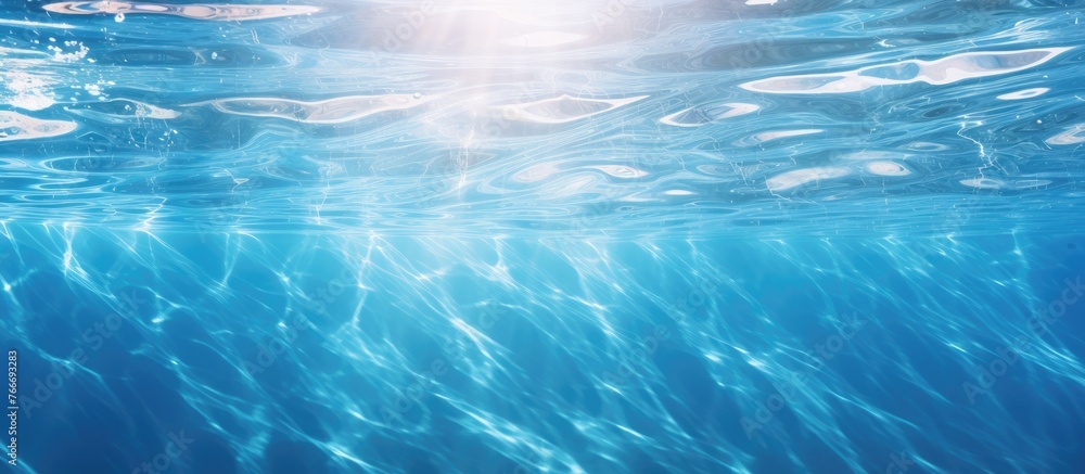 Poster capturing the moment when sunlight filters through the water surface, creating beautiful patterns be