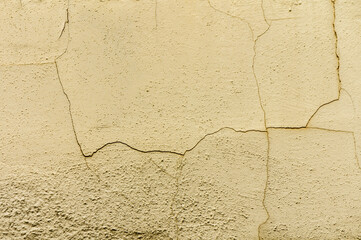 Texture of a concrete wall with cracks and scratches which can be used as a background 1