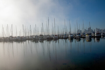 Fototapeta na wymiar heavy fog rolling in westhaven marina