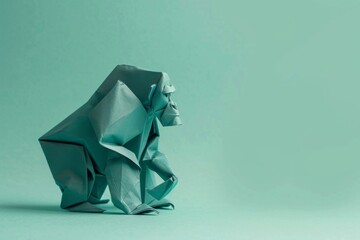 Photo of an origami Gorilla on pastel green background