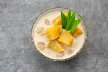 Kolak Ubi, Indonesian traditional dessert, made from sweet potato, coconut milk, sugar and pandanus leaves. 
