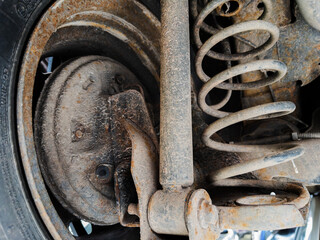 Rusty Car Suspension System Close-Up - obrazy, fototapety, plakaty