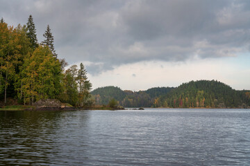 Fototapeta premium Lake Ladoga near the village Lumivaara on a sunny autumn day, Ladoga skerries, Lakhdenpokhya, Republic of Karelia, Russia