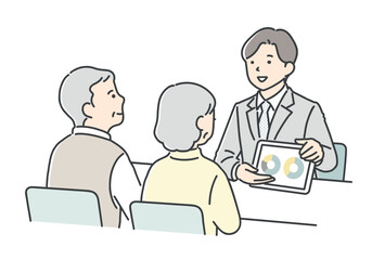 シニア夫婦に案内をする営業担当者
