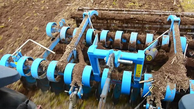 Harrowing of arable land and preparation for new crop in Skurup municipality, Skane, Scania, Sweden, Scandinavia, Europe