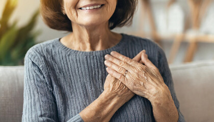 Mature woman in distress, clutching chest, symbolizing heartache and aging