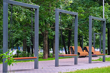 Swing in the city park. general plan