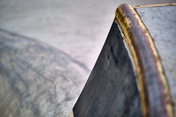 Jumps and Ramps in a Skateboard Park. close-up