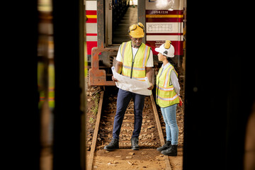 Railway technicians and engineers, Inspect the trains in train repair station before being used to drag train cars to receive or transport goods and people.