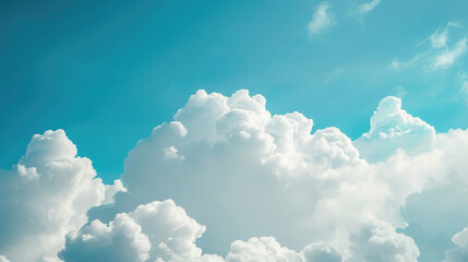 Naklejka na ściany i meble Large white clouds against a blue sky background