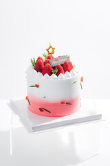 Delicious birthday cake with fresh strawberries, on wooden table and white background. Free space for your text. - 766753865