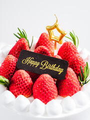 Delicious birthday cake with fresh strawberries, on wooden table and white background. Free space for your text. - 766754003
