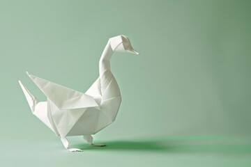 origami Goose on pastel green background