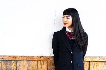 放課後、校舎に残る女子高生