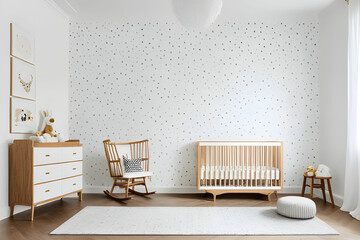 Interior of spacious nursery with wooden crib and empty chair by star wallpaper at contemporary white apartment - obrazy, fototapety, plakaty