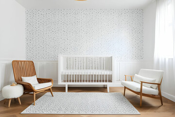 Interior of spacious nursery with wooden crib and empty chair by star wallpaper at contemporary white apartment