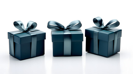 Fototapeta premium three gift colored boxes tied with a satin ribbon on a white background. holiday gift packaging