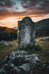 A tombstone on a hill --ar 2:3 Job ID: 0e4254d5-2fea-442e-b4c8-7719ff7adb3b