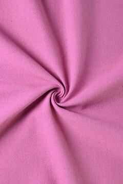 pink cotton texture color of fabric textile industry, abstract image for fashion cloth design background