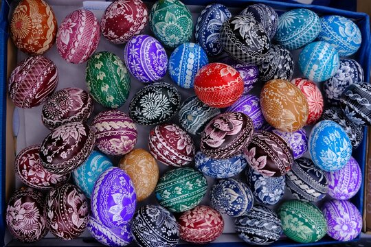 Beautiful handmade colorful Easter eggs in a basket. Kurpie, Poland