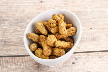 Raw ripe unpeeled peanut heap