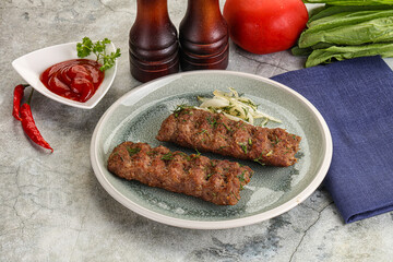 Kebab with beef served onion