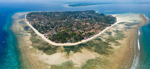Aerial view of the coral reef surrounding the tiny Indonesian island of Gili Air