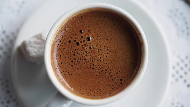 top view of a cup of turkish coffee on table 
