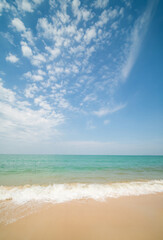 Fototapeta premium Beautiful horizon Landscape summer vertical front view point tropical sea beach white sand clean and blue sky background calm Nature ocean Beautiful wave water travel at Sai Kaew Beach thailand