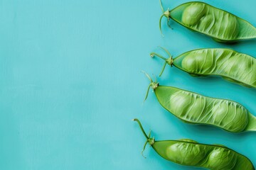 Group of Pea Pods on Blue Background