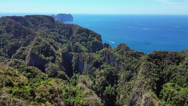 Primeval jungle hills island phi phi island. Nice aerial top view flight panorama overview drone
4k