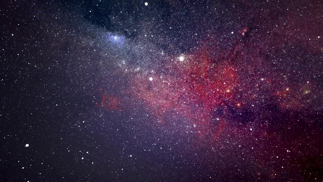 Space travel background among the luminous stars with red background. 4k animation for Video for graphic editing. Travel through the stars, space, universe