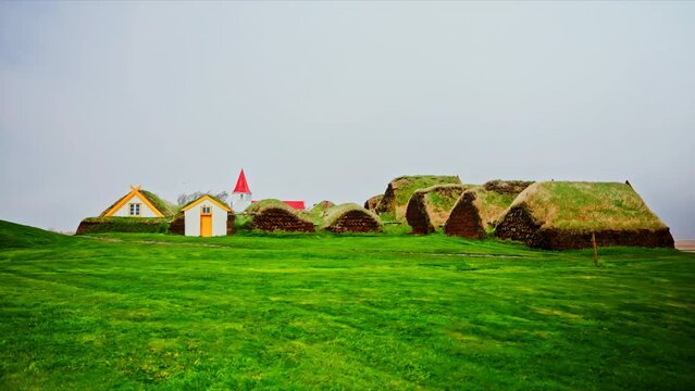 Traditional Icelandic houses with grass on the roof. Glaumb&aelig;r Farm and Museum. Three Turf houses in Iceland with a grass roof. A traditional sod roof house. Iceland houses.