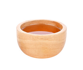 Honey in wooden bowl on transparent png