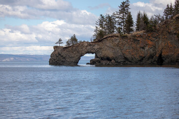 Natural arch near Halibut Cove in Kachemak Bay across from Homer Spit Alaska United States
