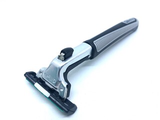 manual beard hair trimmer isolated on white