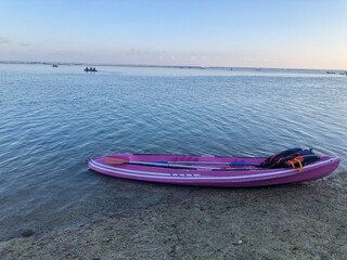 canoeing on the beach in the afternoon