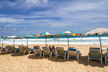 Sunloungers on the beach at Karon beach, Phuket, Thailand