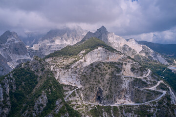Carrara mountains. Quarry in tuscany, Italy, Carrara. Marble quarry in the mountains of Italy. Aerial panorama of marble quarries Carrara.