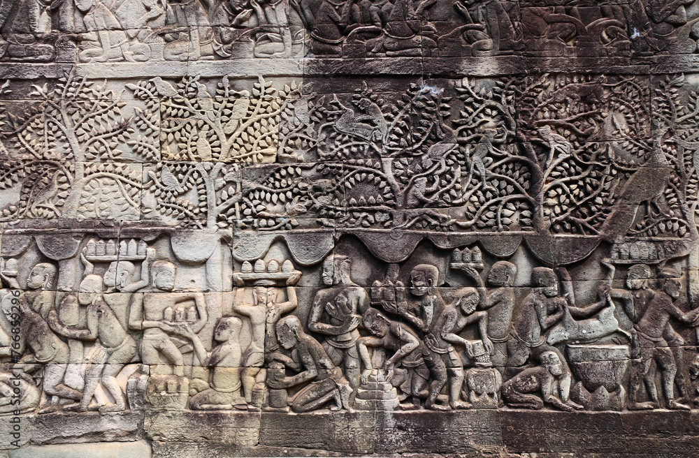 Wall mural wall carving of prasat bayon temple in famous landmark angkor wat complex, siem reap, cambodia. bas-