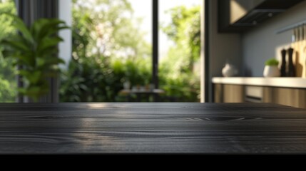 Black table surface with lush green view. Detail of a textured black table surface with a soft-focus view of a bright, green-filled outdoor area through a kitchen window