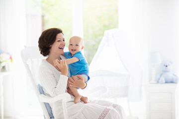 Mother and baby in bedroom